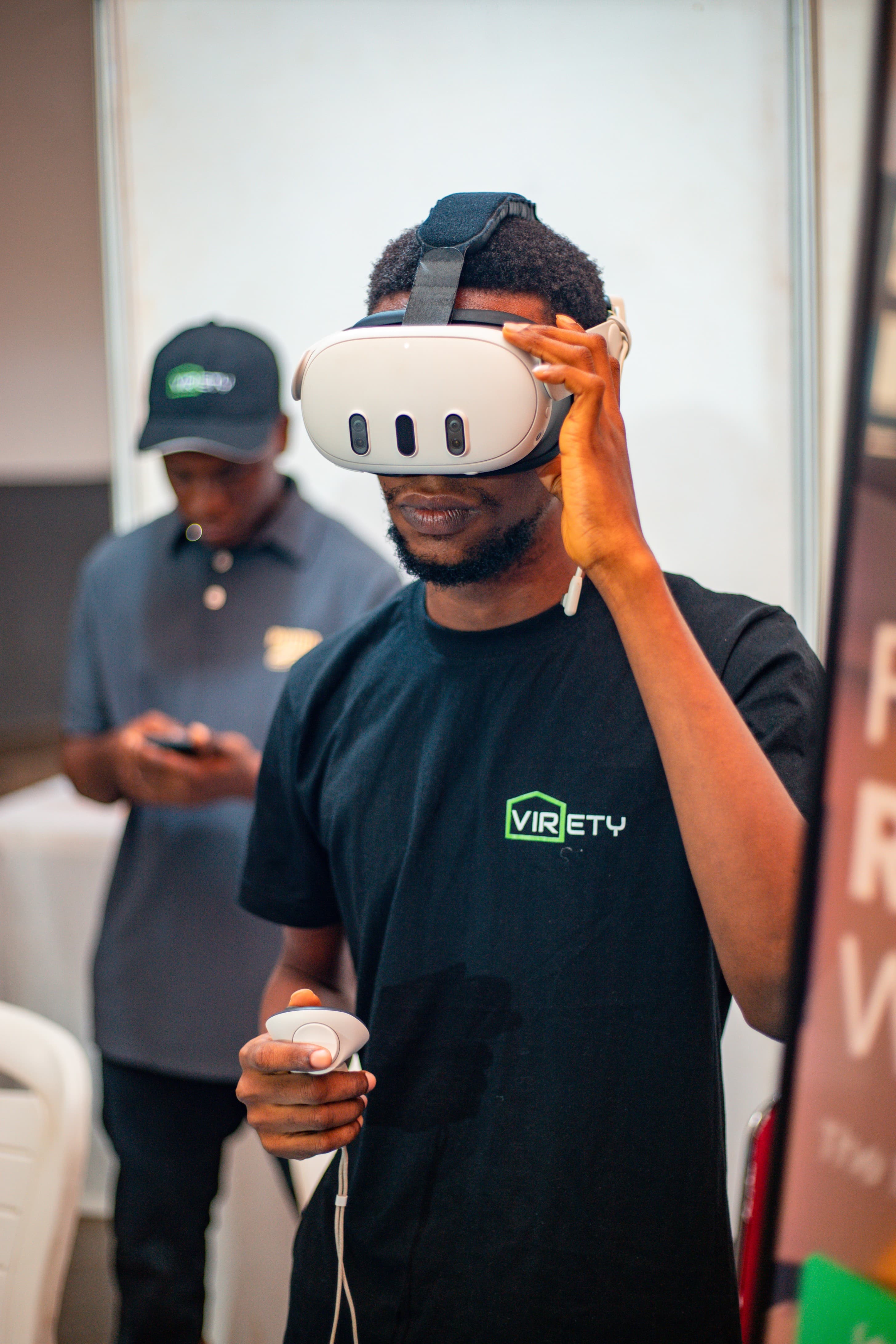 Attendees exploring 360-degree virtual tours at the Virety booth